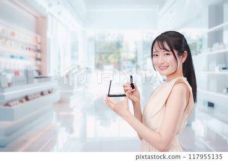 Young woman buying cosmetics 117955135