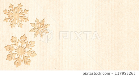 Eco friendly Christmas. Snowflake in cut-out style on recycled cardboard texture. Horizontal banner with eco paper texture. Copy space for text. Ecology, environmental conservation, zero waste concept 117955265