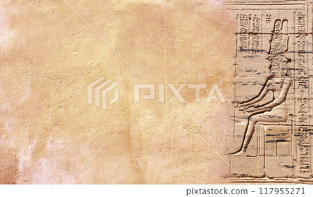 Horizontal  background with ancient Egyptian hieroglyphs and bas-relief of goddess Isis  on stone wall, Egypt, Africa. Backdrop with sandstone carving with hieroglyph. Copy space for text 117955271