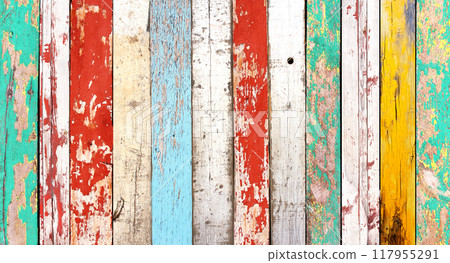 Texture of vintage wood boards with cracked paint of white, red, yellow, green and blue color. Horizontal retro background with old wooden planks of different colors 117955291