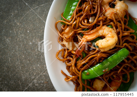 stir-fried yakisoba noodles with green peas and shrimps stir-fried yakisoba noodles with green peas and shrimps 117955445