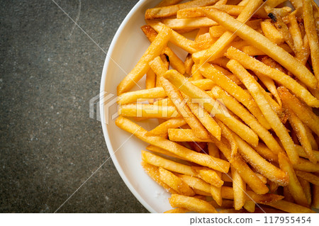 French fries with sour cream and ketchup 117955454