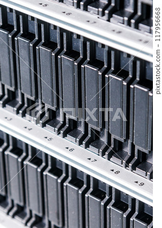 Row of hard disks used for data storage in internet data center 117956668