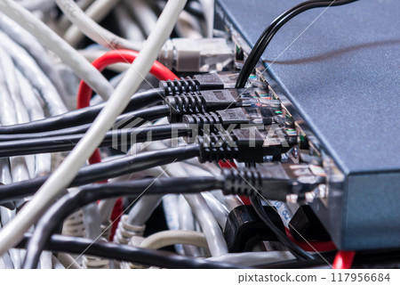 Detail of server room with patch cables 117956684