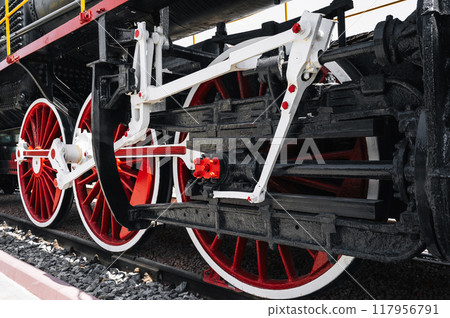 Close-up of the running gear of the locomotive Close-up of the running gear of the locomotive 117956791