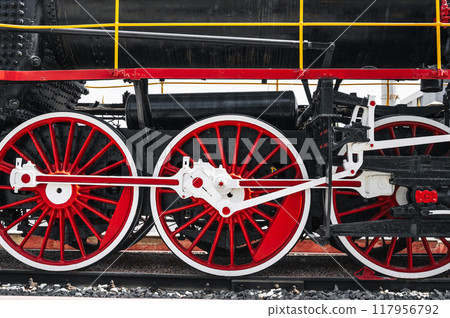 Close-up of the running gear of the locomotive Close-up of the running gear of the locomotive 117956792