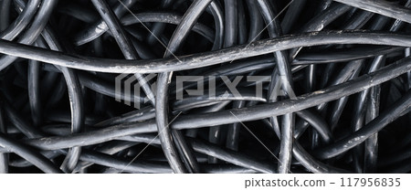 lots of black electrical cables in close-up. Panorama lots of black electrical cables in close-up. Panorama 117956835