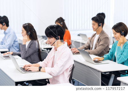 Young men and women receiving a seminar 117957217