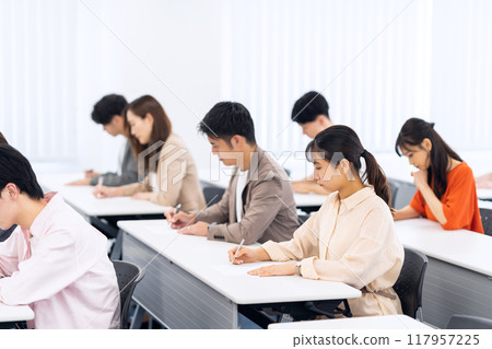 Young men and women receiving a seminar 117957225