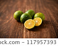 Picking oranges 117957393