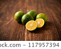 Picking oranges 117957394