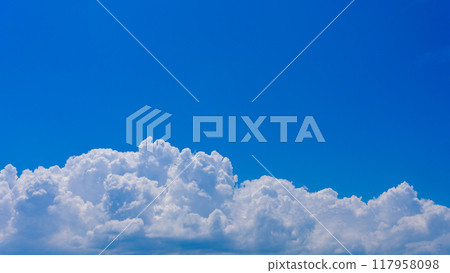 A sea of cumulonimbus clouds in the blue midsummer sky A sea of cumulonimbus clouds in the blue midsummer sky 117958098