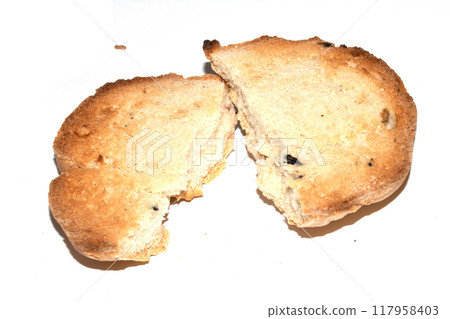 Very Burnt Bread Roll Torn or Cut in Half Toast Close Up Texture 117958403