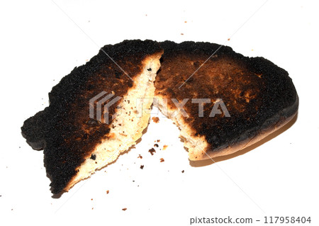 Very Burnt Bread Roll Torn or Cut in Half Toast Close Up Texture Very Burnt Bread Roll Torn or Cut in Half Toast Close Up Texture 117958404