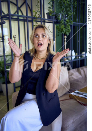a middle-aged plus size woman in old money style clothes in a fancy restaurant a middle-aged plus size woman in old money style clothes in a fancy restaurant 117958746