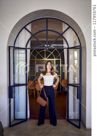 16-year-old teenage girl in old money style clothes in a fancy restaurant 16-year-old teenage girl in old money style clothes in a fancy restaurant 117958761