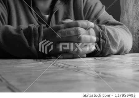 Female pensioner hands. 117959492