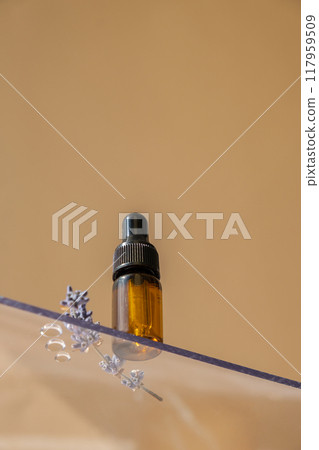 Low angle view of lavender essential oil. Aromatherapy scene natural home fragrance perfumery oil. Wild grown plant herbal ingredient oil. Isometric 117959509