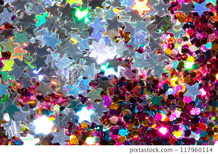 Close Up of Color Shiny Confetti Glitter On White Background Close Up of Color Shiny Confetti Glitter On White Background 117960114