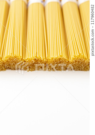 Spaghettini on white background 117960482