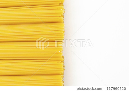 Spaghettini on white background 117960520