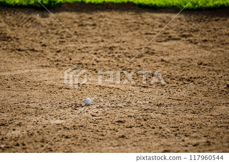 golfball in the Bunker golf course golfball in the Bunker golf course 117960544