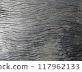 A close-up image of the surface of aged wood 117962133