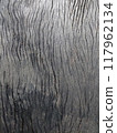 A close-up image of the surface of aged wood 117962134