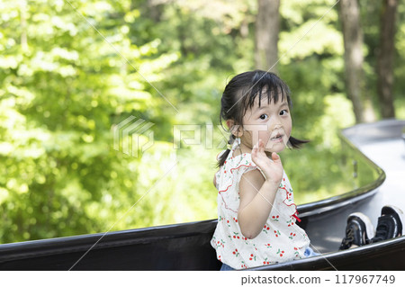 Pretty girls playing in the park 117967749