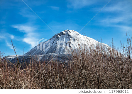 Aerial view of Mount Errigal in the winter, the highest mountain in Donegal - Ireland. Aerial view of Mount Errigal in the winter, the highest mountain in Donegal - Ireland. 117968011