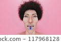 Gummy bear on a woman's tongue. 3d render. 117968128