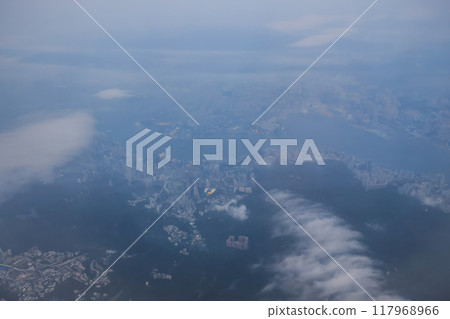 cityscape. Airplane over urban skyline. Concept of travel and air transportation. May 18 2024 117968966