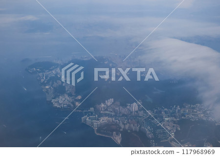 cityscape. Airplane over urban skyline. Concept of travel and air transportation. May 18 2024 cityscape. Airplane over urban skyline. Concept of travel and air transportation. May 18 2024 117968969