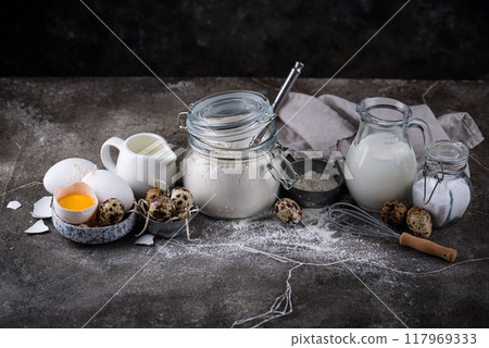 Baking ingredients with flour and eggs Baking ingredients with flour and eggs 117969333