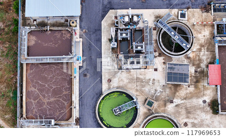 aerial drone view process cleaning dirty sewage water by active sludge Modern technologies wastewater treatment plant 117969653