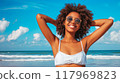 Woman in White Bikini on Beach 117969823