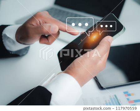 Human hand using smartphone typing, Chatting conversation in chat box icons pop up, Social media marketing concept, Chatting on application communication digital web and social network concept. 117970559