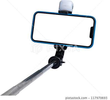 Selfie stick and smartphone on transparent background with transparent cut out screen. 117970693