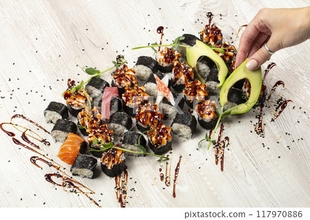 Set of sushi rolls, close-up top view.Japanese food. 117970886