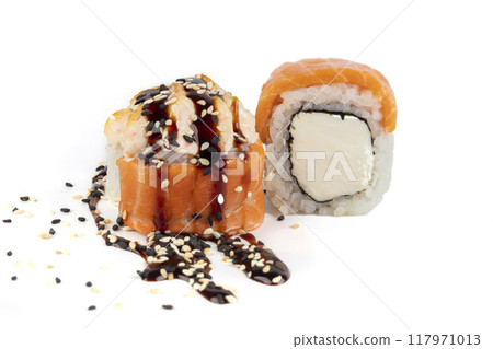 Sushi roll on a white background with Philadelphia cheese, salmon, sprinkled with soy sauce and sprinkled with sesame seeds 117971013