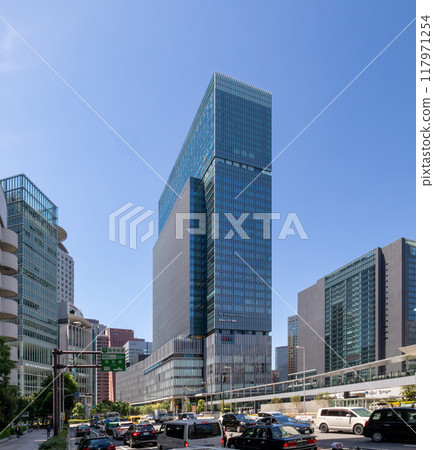 The exterior of JP Tower Osaka (KITTE Osaka) on a clear day, located on the former site of the Osaka Central Post Office, directly connected to JR Osaka Station. Next to Umeda Station The exterior of JP Tower Osaka (KITTE Osaka) on a clear day, located on the former site of the Osaka Central Post Office, directly connected to JR Osaka Station. Next to Umeda Station 117971254