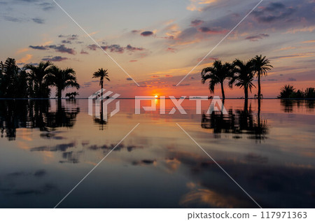 Infinity pool and sunset Infinity pool and sunset 117971363