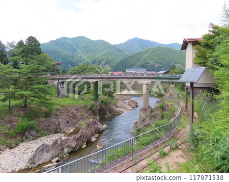 The remains of the silver mine trolley road remain along the river that flows under the garden of the Asada family in Ikuno Town, which is famous for the Ikuno Silver Mine. 117971538