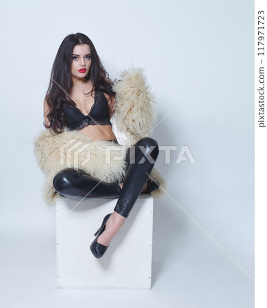 Beautiful sensual brunette woman with long hair  117971723