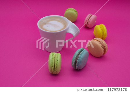 Macarons with Coffee on a Pink Background Macarons with Coffee on a Pink Background 117972178