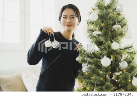 Christmas wreath and women Christmas wreath and women 117972343