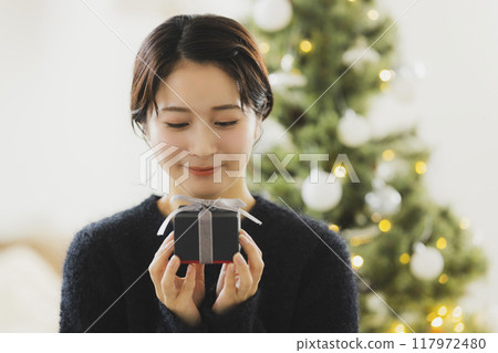 Christmas tree and women Christmas tree and women 117972480