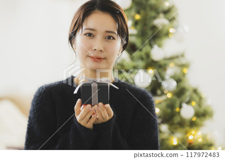 Christmas tree and women Christmas tree and women 117972483