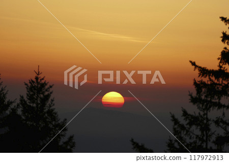 Sunset at Rechelberg mountain in wintertime, Bavaria, Germany Sunset at Rechelberg mountain in wintertime, Bavaria, Germany 117972913
