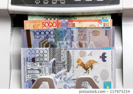 Kazakhstani tenge in the counting machine Kazakhstani tenge in the counting machine 117973254